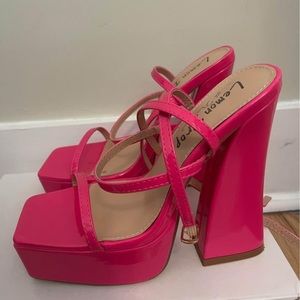 Dolls Kill pink platform heels